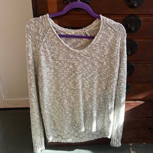 Large gray and white knit sweater